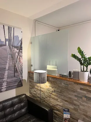 B & E Store Front Inc