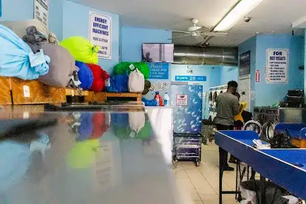Sudsy Water Dry Cleaner and Laundry