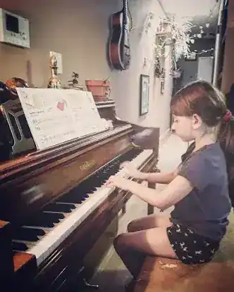 Western Queens piano and strings lessons