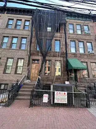 ZHI RESTORATION & CONSTRUCTION INC
