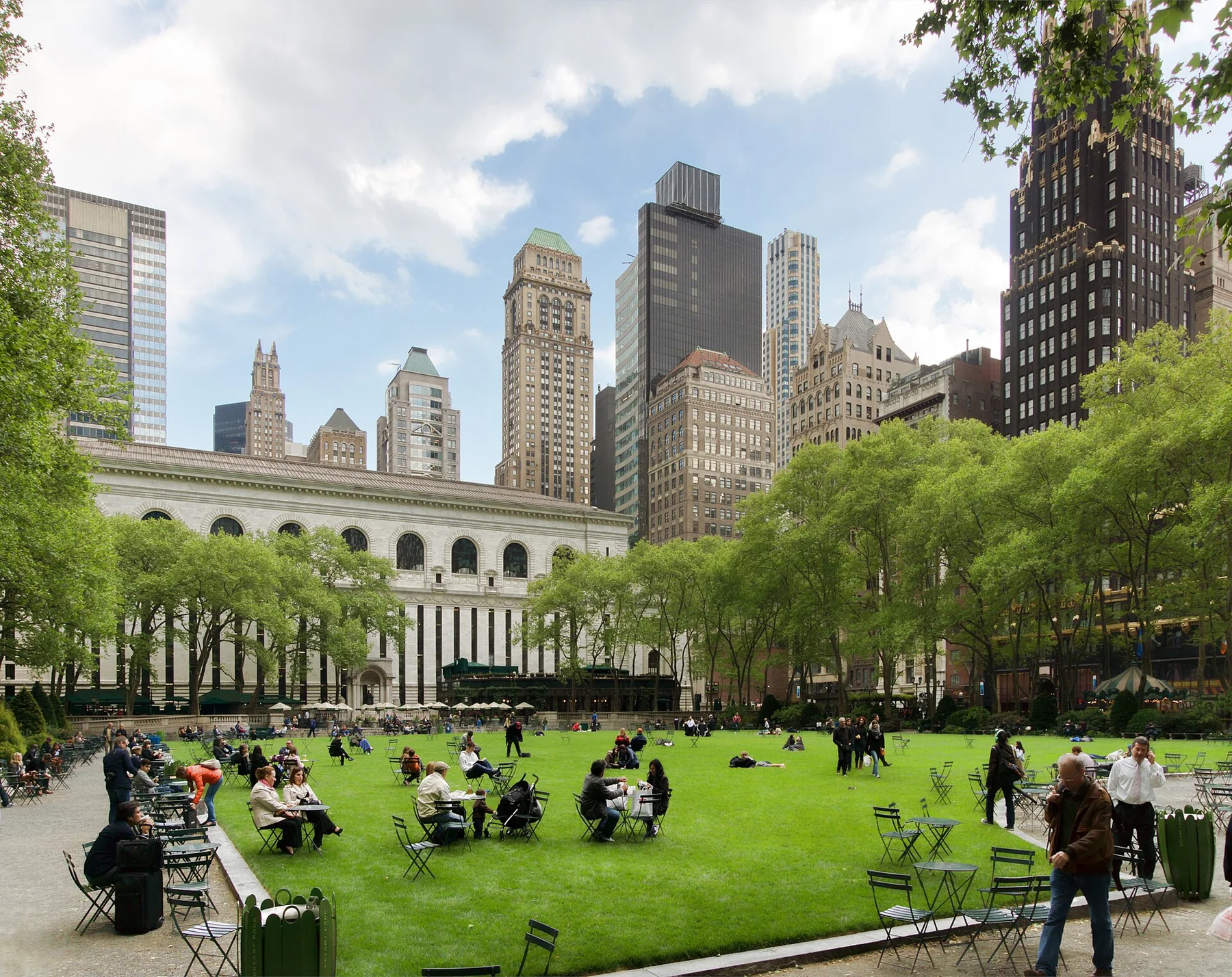 Bryant Park lawn with the New York Public Library and Midtown buildings